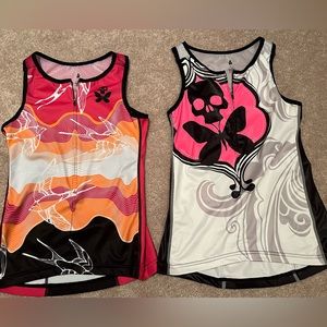 A pair of Betty Designs Triathlon Sleeveless Tops.